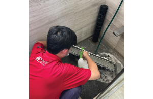 PureAir's technician chemically disinfecting the aircon